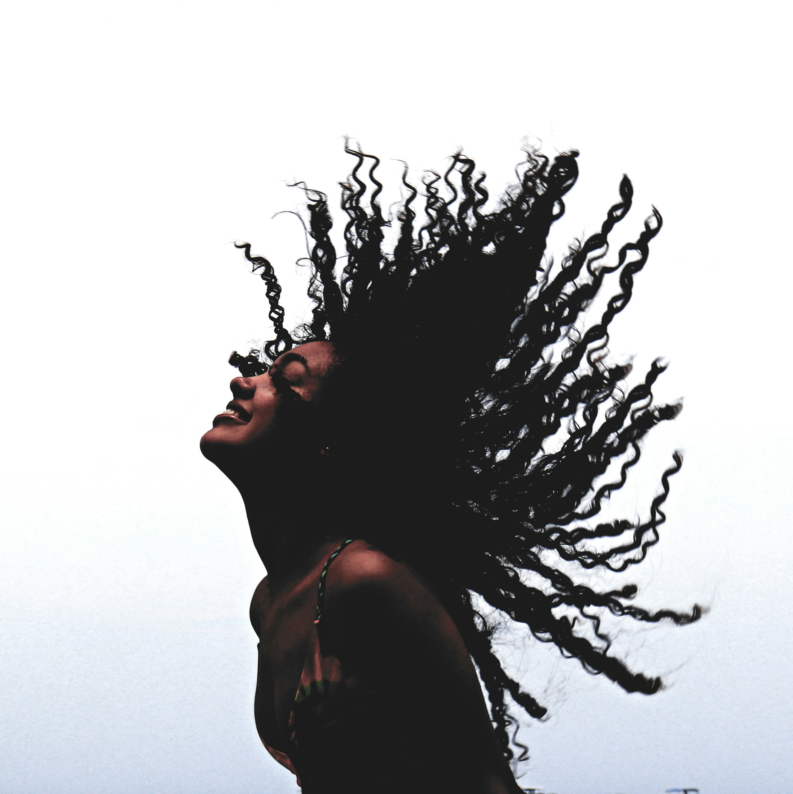 an image of a lady with a lot of wet afro hair